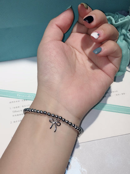 T Bow Charm Bead Bracelet